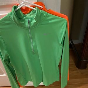 Nike half zips.  Med